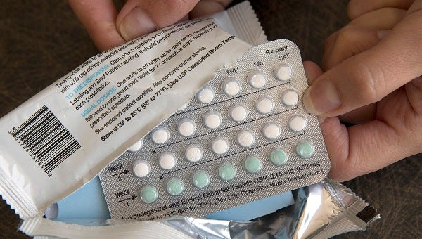 In this Aug. 26, 2016, file photo, a one-month dosage of hormonal birth control pills is displayed in Sacramento, Calif. (Rich Pedroncelli/AP Photo, File)