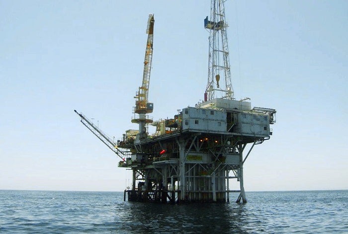 This undated photo provided by the California State Lands Commission shows Platform Holly, an oil drilling rig in the Santa Barbara Channel offshore of the city of Goleta, Calif. The platform will be decommissioned and its operator is seeking bankruptcy protection, nearly two years after the platform was idled when an onshore pipeline ruptured and spilled a massive amount of oil into the ocean, the state and Venoco LLC said Monday, April 17, 2017. (State Lands Commission via AP)