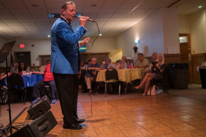 Gil Torres of Blue Velvet performs at the Father's Day spaghetti dinner at the South Philly String Band Club. (Branden Eastwood for WHYY)