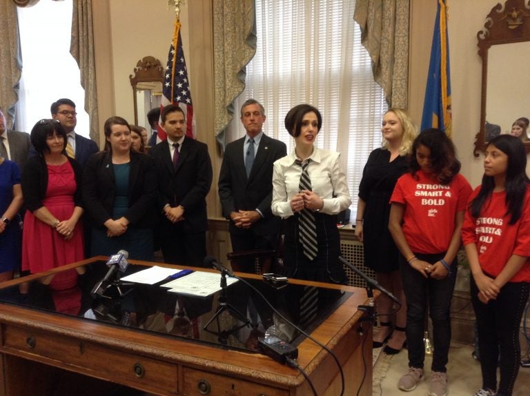 Activist Fraidy Reiss shows her support of Delaware's ban on child marriages. (WHYY/Zoe Read)