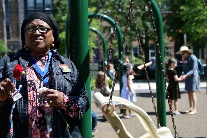 Nabila Bay, who works nearby, came in support of honoring ancestors as the city makes an announcement of the development of Bethel Burying Ground Historic Site Memorial at Weccacoe Playground, in South Philadelphia, on Tuesday June 12, 2018. (Bastiaan Slabbers for WHYY)