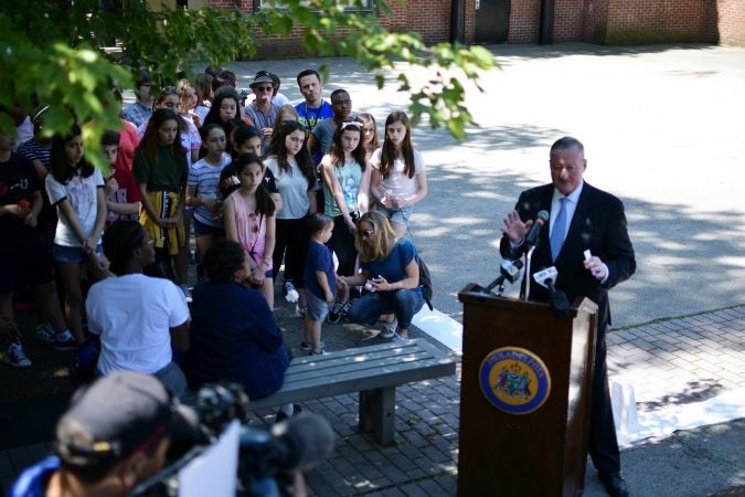 Major Jim Kenney speaks as the city officially announces the development of Bethel Burying Ground Historic Site Memorial during a ceremony at Weccacoe Playground, in South Philadelphia, on Tuesday June 12, 2018. (Bastiaan Slabbers for WHYY)