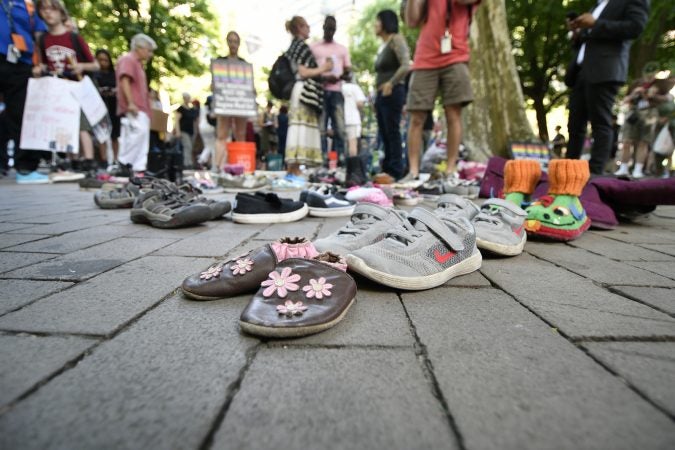 Shoes were displayed to symbolize the children separated from their parents by U.S. immigration officials. (Bastiaan Slabbers for WHYY)