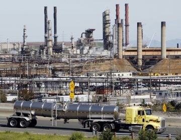 A 2012 fire at the Chevron Refinery in Richmond, Calif., led the state to update regulations governing how disasters at refineries are investigated, and requiring companies to disclose information to emergency workers and citizens. The Environmental Protection Agency is moving to block similar federal chemical regulations from taking effect. (Paul Sakuma/AP)