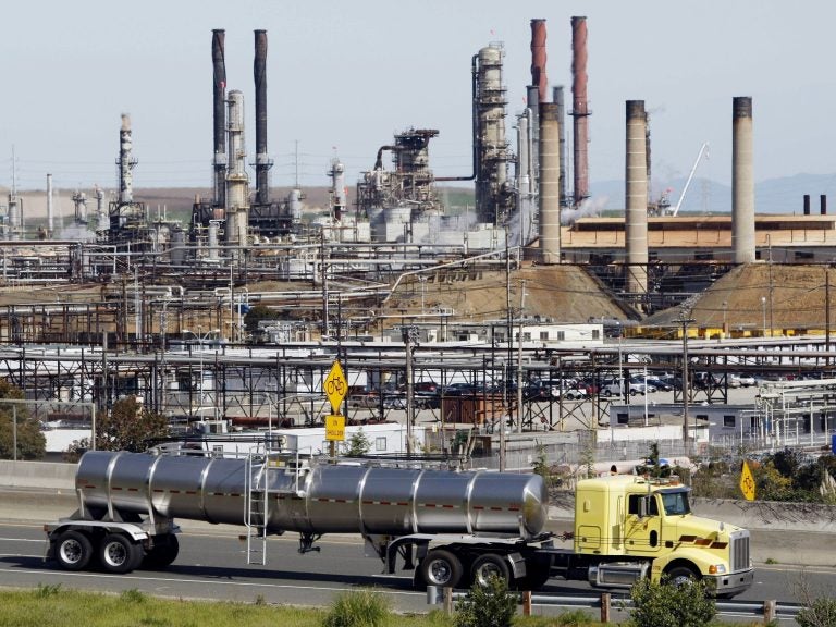 A 2012 fire at the Chevron Refinery in Richmond, Calif., led the state to update regulations governing how disasters at refineries are investigated, and requiring companies to disclose information to emergency workers and citizens. The Environmental Protection Agency is moving to block similar federal chemical regulations from taking effect. (Paul Sakuma/AP)