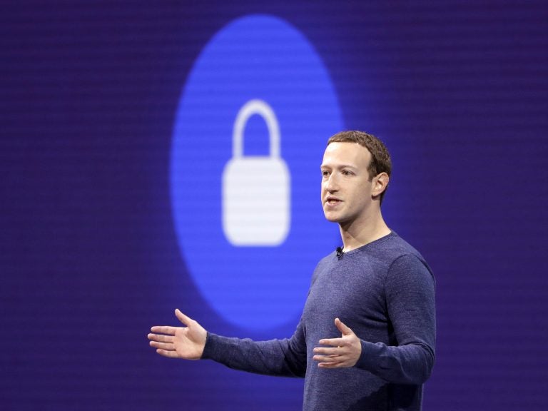 Facebook CEO Mark Zuckerberg is pictured at F8, Facebook's developer conference last month. On Thursday, the company announced a new test feature had changed users' privacy settings without their consent. (Marcio Jose Sanchez/AP)