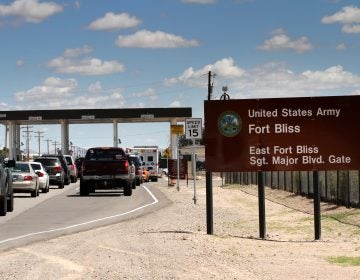 Cars wait to enter Fort Bliss in El Paso, Texas, in 2014. The U.S. Army Base is one of four that likely will be tasked with housing immigrant children following a request Thursday by the Department of Health and Human Services. (Juan Carlos Llorca/AP)