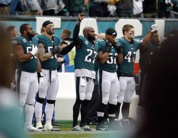 Philadelphia Eagles' Malcolm Jenkins (27) raises his fist during the playing of the national anthem ahead of an NFL football game against the San Francisco 49ers, Sunday, Oct. 29, 2017, in Philadelphia. (AP Photo/Chris Szagola)