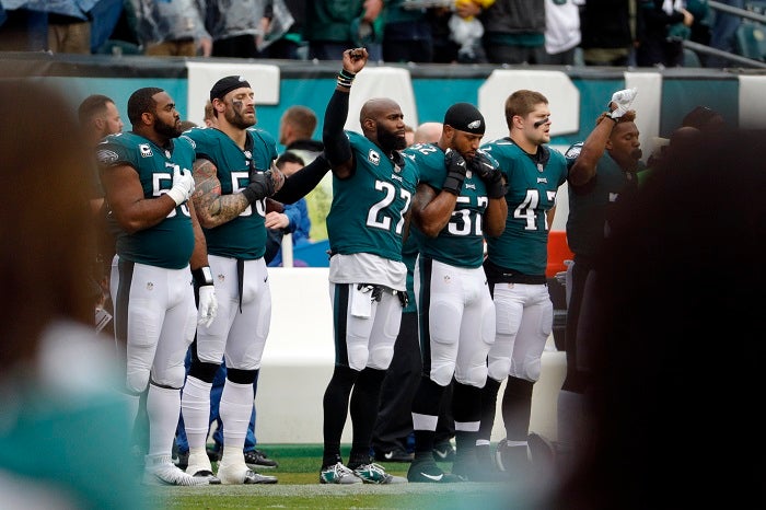 Philadelphia Eagles' Malcolm Jenkins (27) raises his fist during the playing of the national anthem ahead of an NFL football game against the San Francisco 49ers, Sunday, Oct. 29, 2017, in Philadelphia. (AP Photo/Chris Szagola)