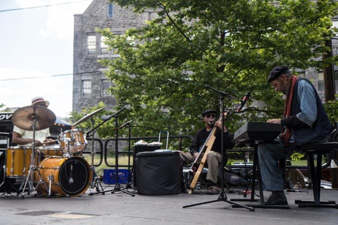 Abdul Rashid on the keys, Tyrone Brown on the bass, and Alan Nelson on the drums performed at an Eid al-Fitr celebration, marking the end of Ramadan. (Kimberly Paynter/WHYY)