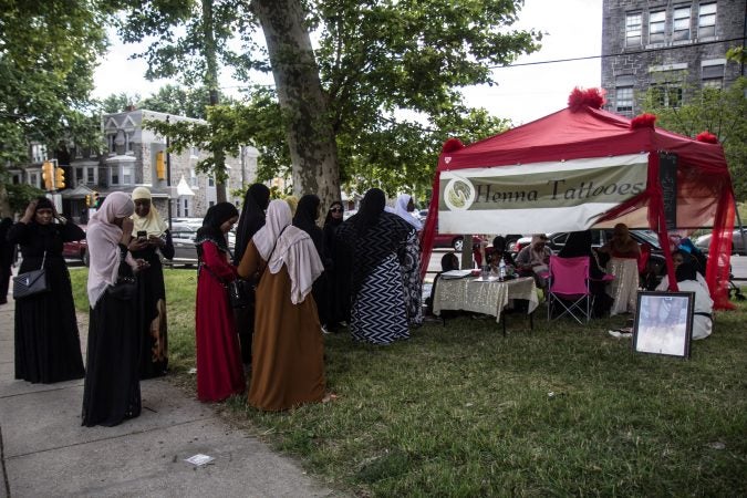 The Philadelphia Muslim community gathered at Clara Muhammad Square for an Eid al-Fitr celebration, marking the end of Ramadan. (Kimberly Paynter/WHYY)