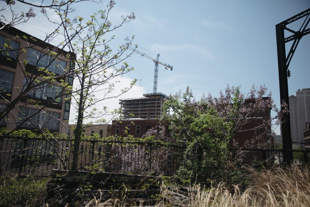 From the Reading viaduct, PCDC's Eastern Tower project rises in the distance. 