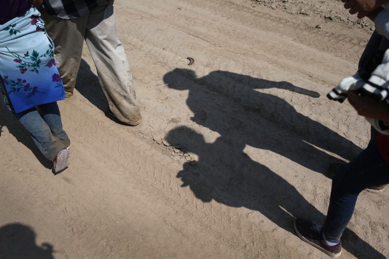 Central American immigrant families walk after crossing from Mexico into the United States to seek asylum in Texas. Central American immigrant families walk after crossing from Mexico into the United States to seek asylum in Texas. (John Moore/Getty Images)
