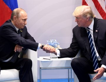

President Trump and Russian President Vladimir Putin shake hands during a meeting on the sidelines of the G20 Summit in Hamburg, Germany, on July 7, 2017. The two leaders are expected to meet again over the summer. (Saul Loeb/AFP/Getty Images)