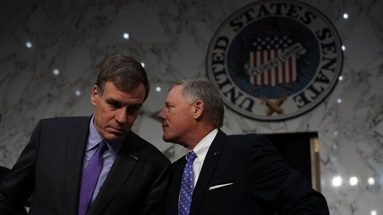 Senate intelligence committee Chairman Sen. Richard Burr, R-N.C. (right) and committee Vice Chairman Sen. Mark Warner, D-Va. (left) wait for the beginning of a confirmation hearing on May 9, 2018 in Washington, D.C. (Alex Wong/Getty Images)