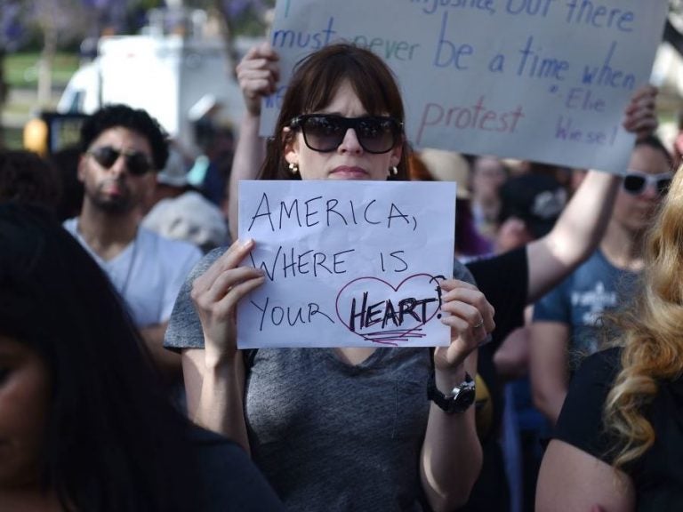 Critics of U.S. government policy that separates children from their parents when they cross the border illegally from Mexico protest in downtown LA on June 14. The former first ladies, and Melania Trump, have pushed back against the policy