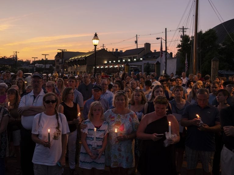 A crowd gathered in downtown Annapolis on Friday to honor five people who were killed in Thursday's attack on the Capital Gazette offices. (The Washington Post/Getty Images)