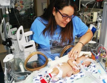 Roxannie Vazquez watches over her son Jacob Ramiro at the neo-natal intensive care unit of a hospital in Macon, Georgia. He suffers from chronic lung disease. His mom says mold grew in his ventilator in Puerto Rico after Hurricane Maria damaged the pediatric hospital in San Juan. (Emily Cureton)
