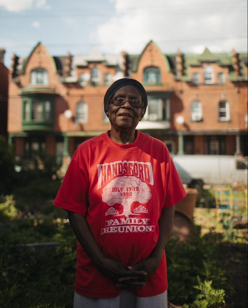 Mildred Johnson in the Viola Street Community Garden. She has lived in East Parkside since 1956. 