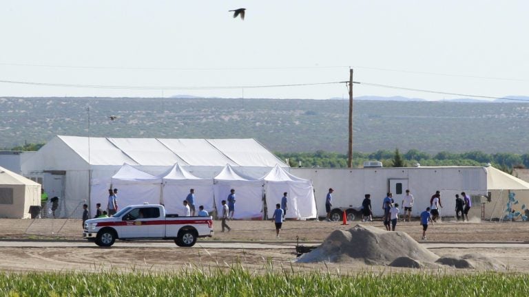 The Pentagon plans to build temporary camps for detained immigrants. Here, children of detained migrants are seen at a tent encampment near the U.S. Customs and Border Protection port of entry in Tornillo, Texas. The Pentagon plans to build temporary camps for detained immigrants. Here, children of detained migrants are seen at a tent encampment near the U.S. Customs and Border Protection port of entry in Tornillo, Texas. (Jose Luis Gonzalez/Reuters)