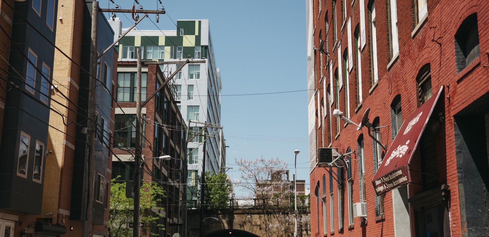 The Reading Viaduct wends its way through Callowhill, its tunnels framing views through the changing neighborhood. May 2018