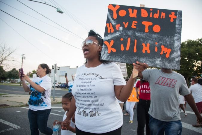 Rashaun “Pacman” Washington was shot and killed by police on July 14, 2018. Dozens of community members came together on July 19, 2018 to march to the city police station to demand justice for his death. (Emily Cohen for WHYY)