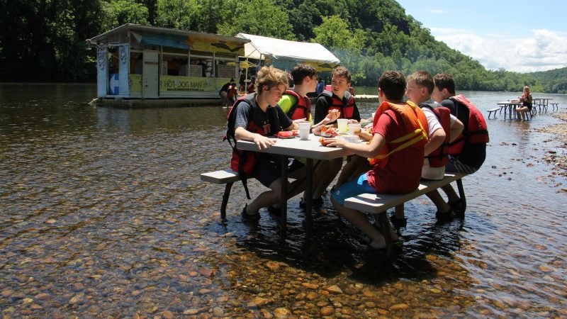 Located in a remote spot on the Delaware River tubing route, the Famous River Hot Dog Man is the only game in town for tubers, whose lazy journeys can last four to six hours. (Emma Lee/WHYY)