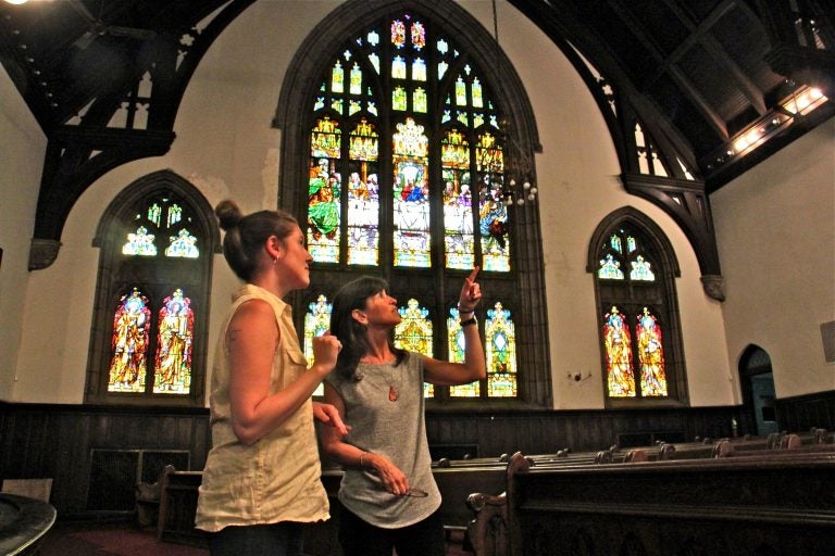 Heidi Segall Levi of Community Design Collaborative (right) and Rachel Hildebrandt of Partners for Sacred Places talk about potential uses for the main sanctuary in Wharton-Wesley United Methodist Church.
