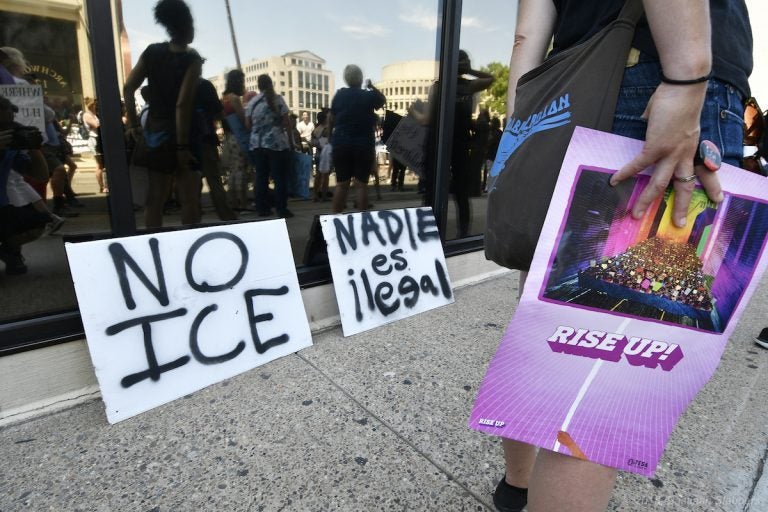 Protesters gather at the U.S. Immigration and Customs Enforcement field office at North Eighth Street after a rally in Center City Philadelphia June 30. (Bastiaan Slabbers for WHYY)