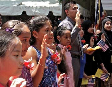 Thirteen children from seven nations took the Oath of Allegience to become U.S. citizens during a naturalization ceremony at the Betsy Ross House in Philadelphia.