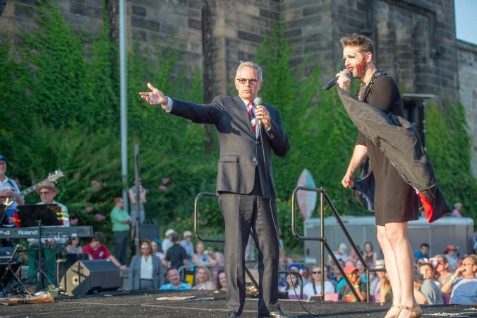 Philadelphia District Attorney Larry Krasner  condemns U.S. Immigration and Customs Enforcement to the cheers of the attending crowd in July 2018. (Jonathan Wilson for WHYY)