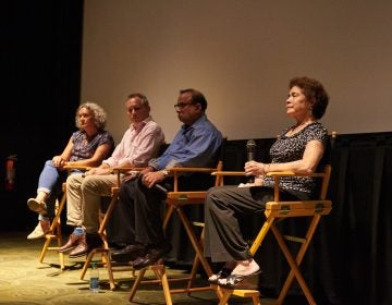 (From left) Executive Producer Elisa Gambino; Director Neal Broffman; father, Akhil Tripathi;  and mother, Judy Tripathi; during a Q&A after a screening of 2015 documentary, Help Us Find Sunil Tripathi. The documentary was screened in Sunil's hometown for the first time on July 26, 2018, at the Bryn Mawr Film Institute, in Sunil's hometown. (Natalie Piserchio for WHYY)