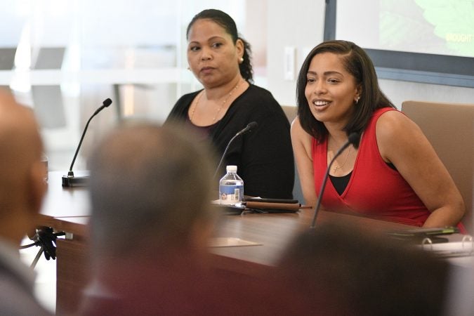 Gia Morón, executive vice president of WomenGrow, and Desirée Ivey, Philadelphia market leader for WomenGrow, participate in a forum on the business of medicinal and recreational use of cannabis in the African-American community. (Bastiaan Slabbers for WHYY)
