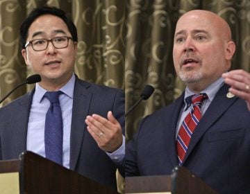 Democrat Andy Kim (left) and Republican incumbent  U.S. Rep. Tom MacArthur during a debate at the South Jersey Chamber of Commerce meeting in Mouth Laurel. (Emma Lee/WHYY)