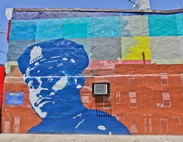 A new mural at 29th and Ridge Avenue honors Sergeant Robert Wilson III who lost his life in the line of duty. (Kimberly Paynter/WHYY)