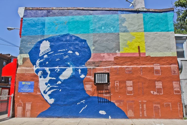 A new mural at 29th and Ridge Avenue honors Sergeant Robert Wilson III who lost his life in the line of duty. (Kimberly Paynter/WHYY)