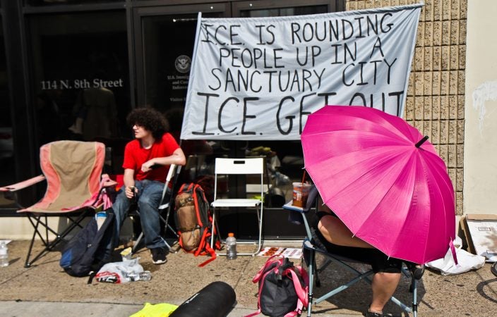 An encampment is protesting ICE outside of their headquarters at 8th and Cherry streets in Philadelphia. (Kimberly Paynter/WHYY)