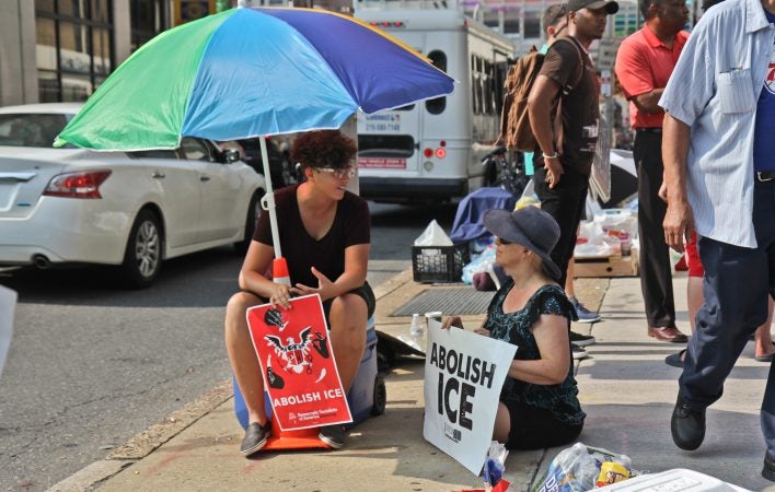 An encampment of protesters is calling for the end of ICE outside of its office at Eighth and Cherry streets in Philadelphia. (Kimberly Paynter/WHYY)