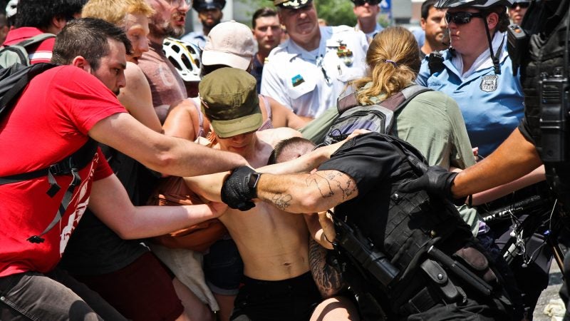 Protesters clash with police at Philadelphia’s ICE offices at Eighth and Cherry streets. (Kimberly Paynter/WHYY)