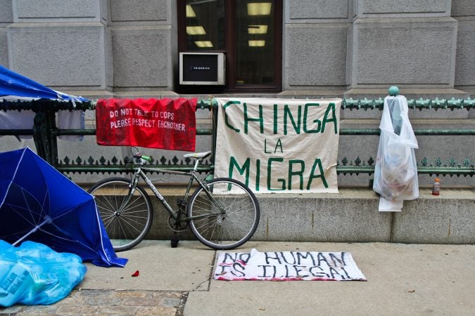 Immigration policy protesters have moved from the ICE building at Eighth and Cherry streets to City Hall. (Kimberly Paynter/WHYY)