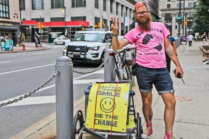 Joe Cox is a bike courier and runs an organization that helps feed the homeless. He’s been at the camp since it started on Monday. (Kimberly Paynter/WHYY)