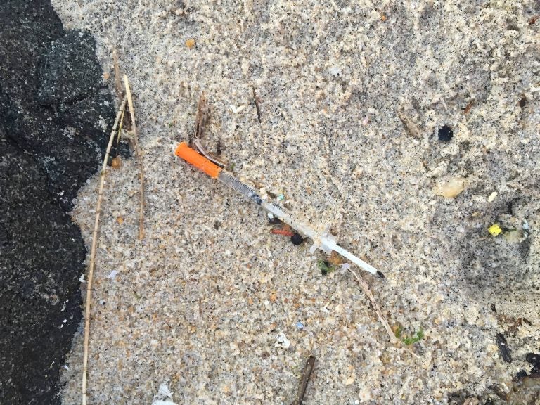 A hypodermic syringe found on a beach in Monmouth County's Deal Friday morning. (Photo: Robert Siliato)