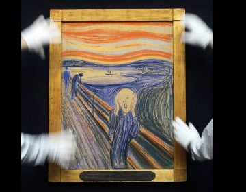 Edvard Munch's 'The Scream' is seen as it is hung for display at Sotheby's Auction Rooms in London, Thursday, April 12, 2012.  (AP Photo/Kirsty Wigglesworth)