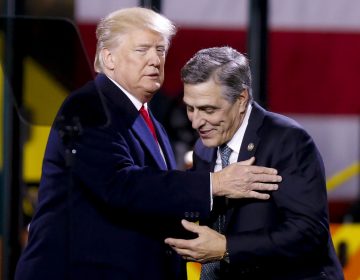 President Donald Trump, (left), greets Pa. Rep. Lou Barletta, R.Pa., before a speech at H&K Equipment Co. on Thursday, Jan. 18, 2018 in Coraopolis, Pa. Barletta is running for the U.S. Senate. (Keith Srakocic/AP Photo)