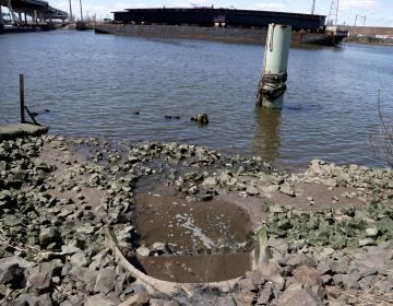 A spillway is seen along the Hackensack River near the construction of the new Newark Turnpike bridge on April 26 in Jersey City, N.J. (Julio Cortez/AP Photo)