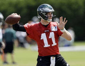 In this Thursday, June 7, 2018, file photo, Philadelphia Eagles' Carson Wentz runs a drill during an organized team activity at the NFL football team's practice facility, in Philadelphia. (Matt Slocum/AP Photo, File)