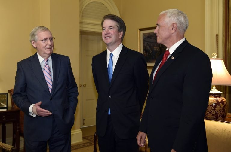 Senate Majority Leader Mitch McConnell of Ky., (left), speaks as he talks about Supreme Court nominee Brett Kavanaugh, (center), as Vice President Mike Pence, (right), listens, during a visit Capitol Hill in Washington, Tuesday, July 10, 2018. Kavanaugh is on Capitol Hill to meet with Republican leaders as the battle begins over his nomination to the Supreme Court. (Susan Walsh/AP Photo)