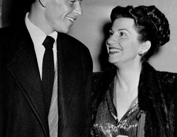 In this Oct. 23, 1946 file photo, singer Frank Sinatra and his wife Nancy smile broadly as they leave a Hollywood night club following a surprise meeting. Nancy Sinatra Sr., the childhood sweetheart of Frank Sinatra who became the first of his four wives and the mother of his three children, has died. She was 101. (AP Photo/File)