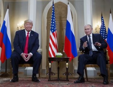 Russian President Vladimir Putin, right, makes a statement as U.S. President Donald Trump, left, looks on at the beginning of a meeting at the Presidential Palace in Helsinki, Finland, Monday, July 16, 2018.