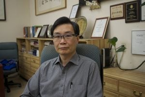 Albert Fok, head of the Chinatown Business Improvement Area, inside his herbal medicine shop near East Hastings street. Photo by Elana Gordon, WHYY